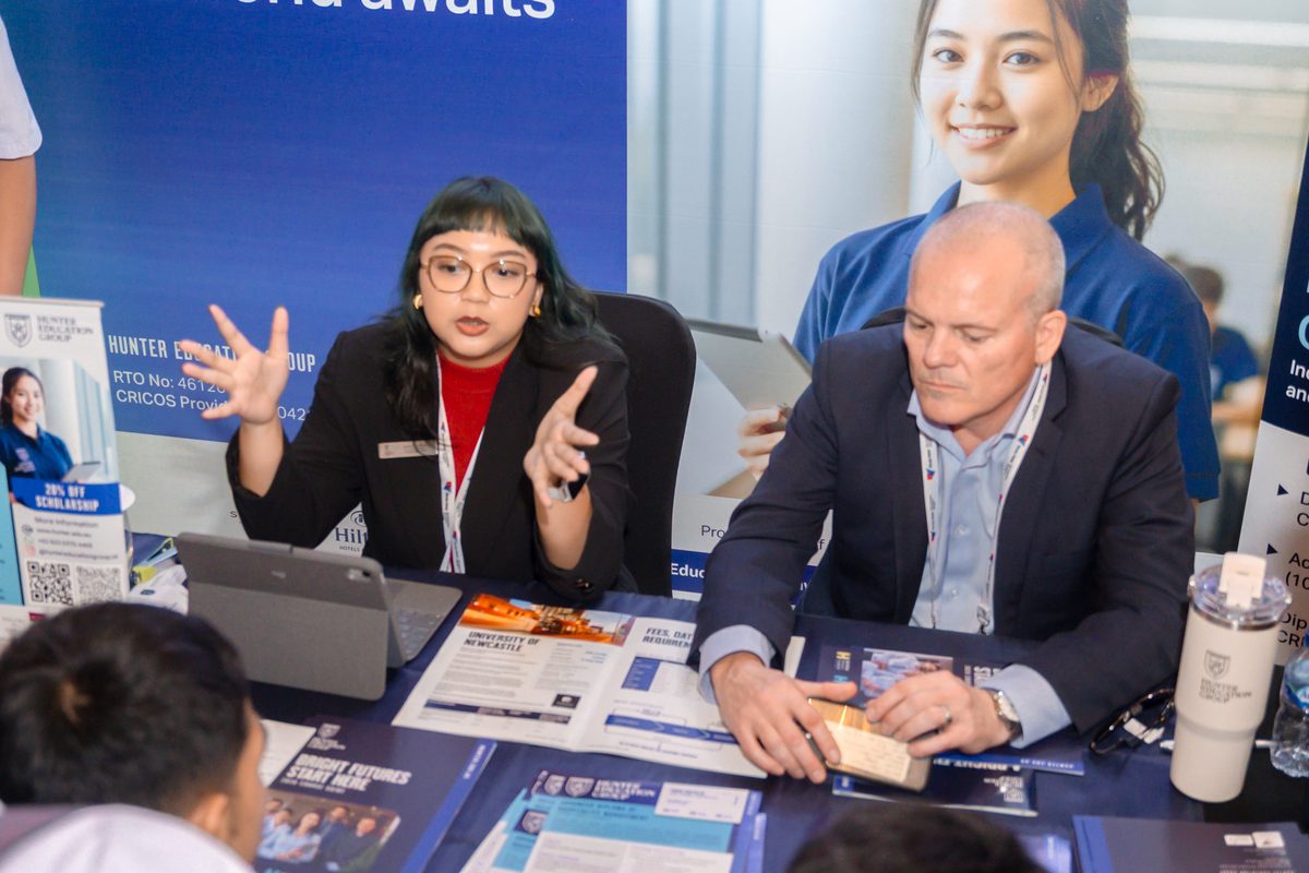 Hunter Education Group team meeting prospective students at the Jakarta education exhibition